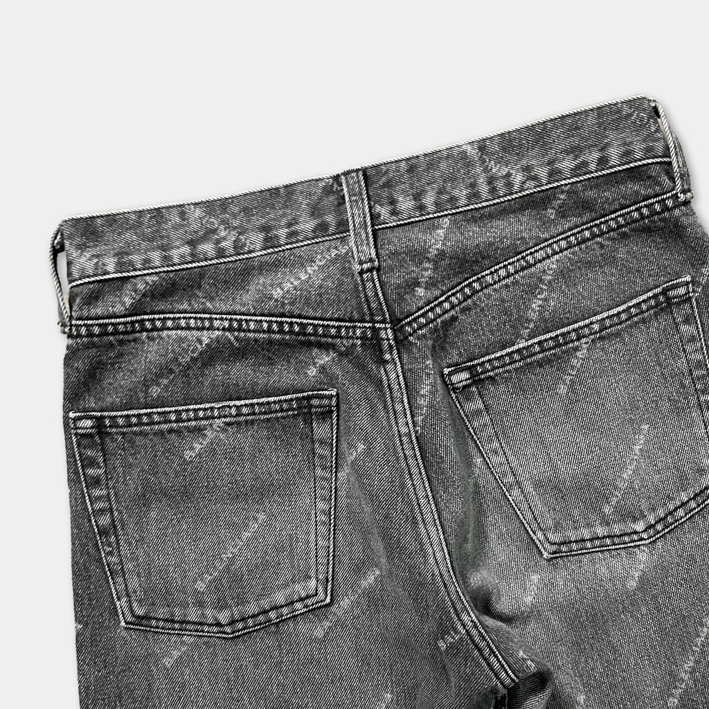 a pair of black and white jeans with a distinctive pattern.