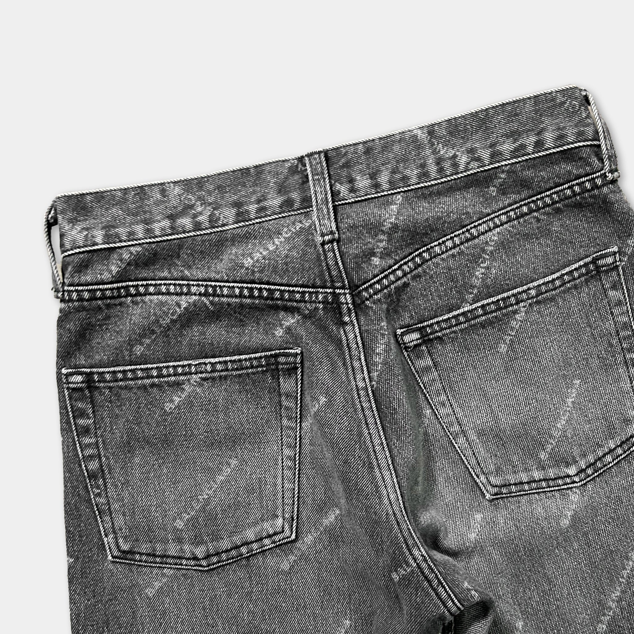 a pair of black and white jeans with a distinctive pattern.