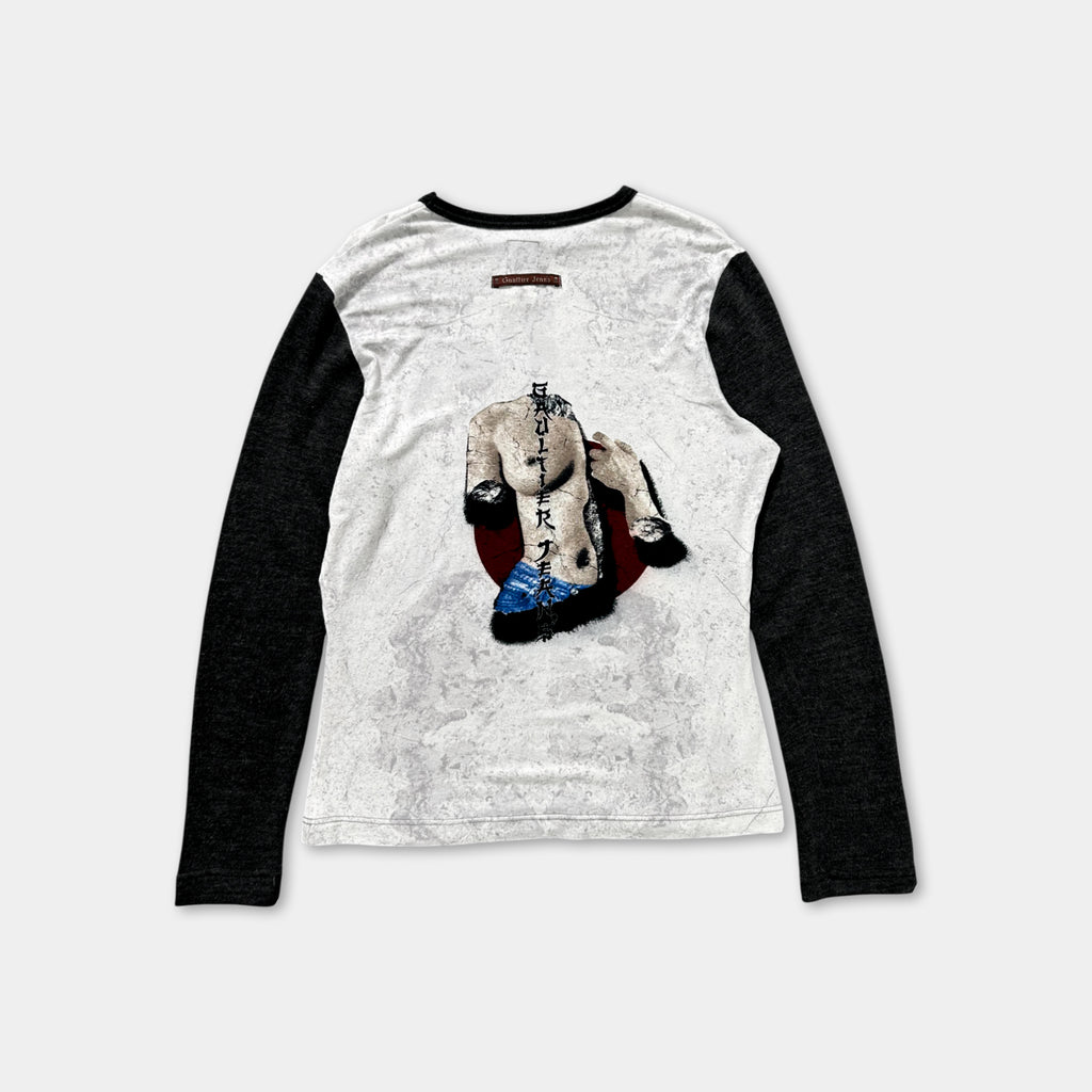 a white long-sleeved shirt with a graphic design on the back.