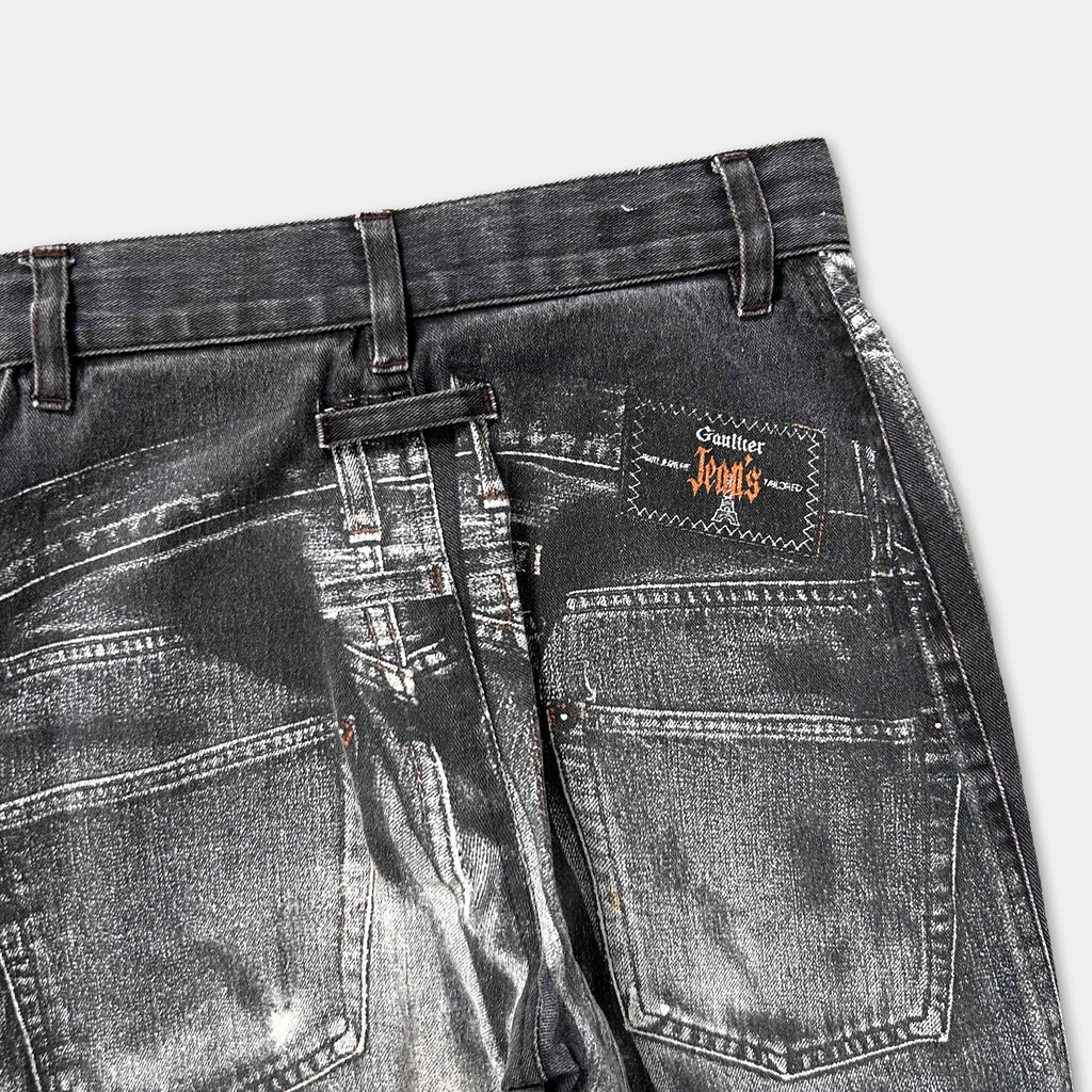 a pair of black jeans with a label on the back pocket.