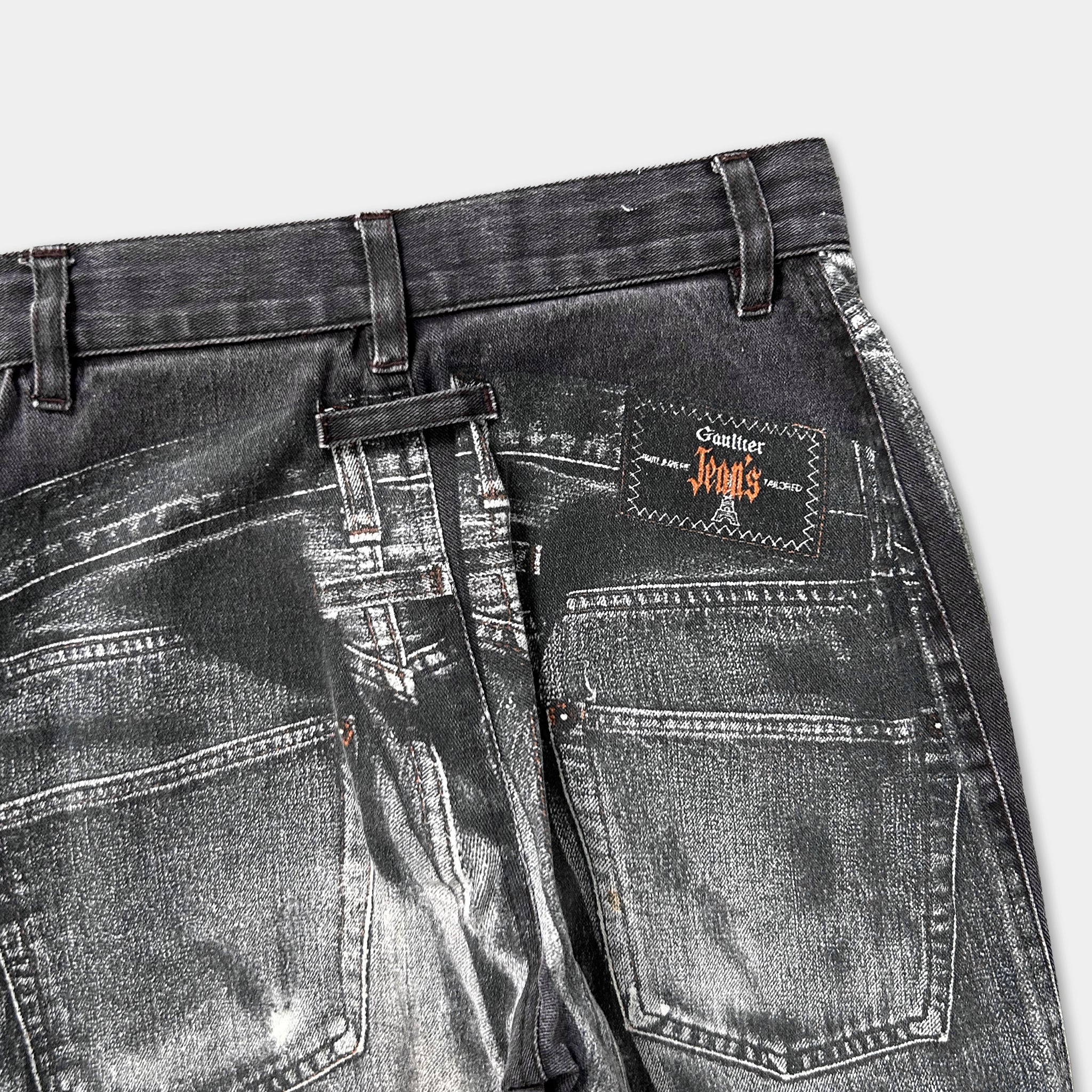 a pair of black jeans with a label on the back pocket.