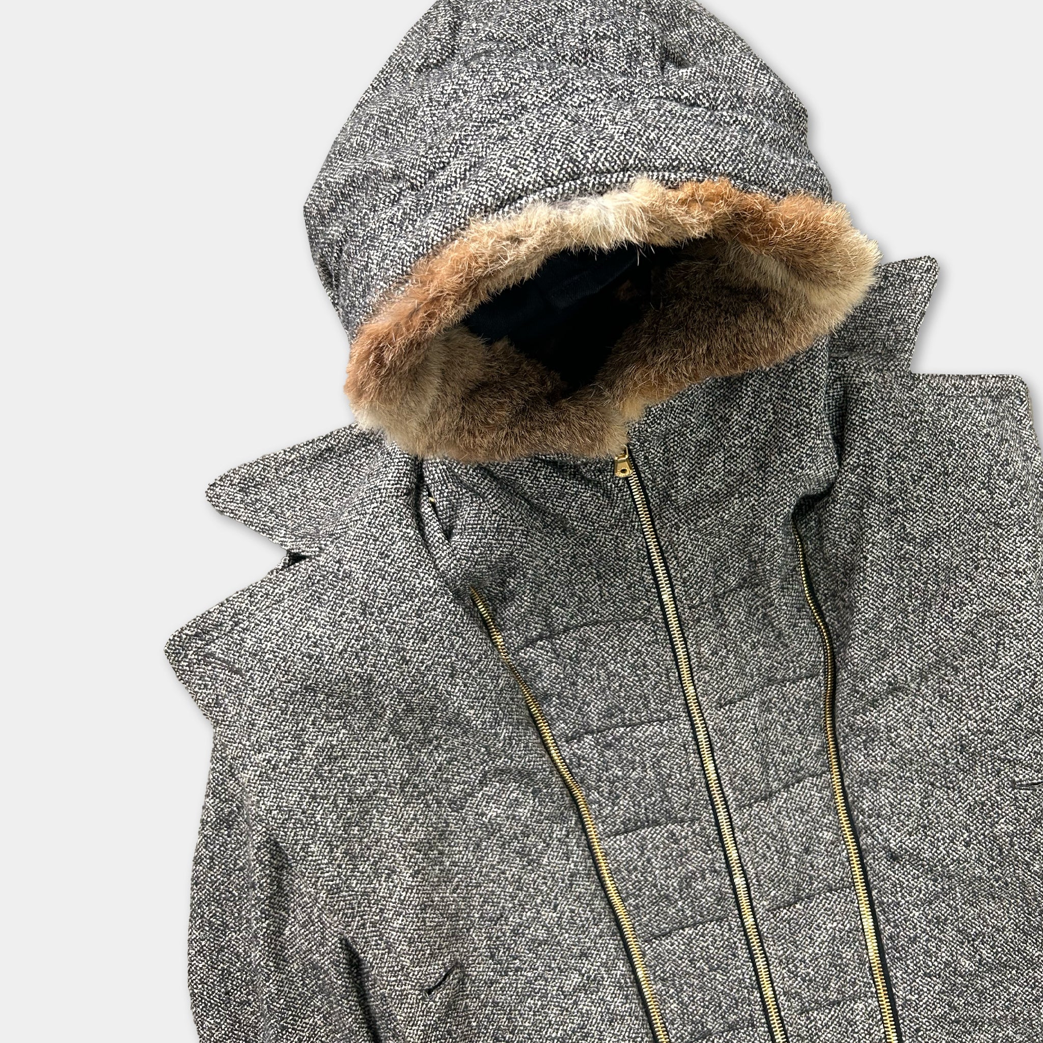A gray and brown fur-lined hooded winter coat with a zipper and pockets.