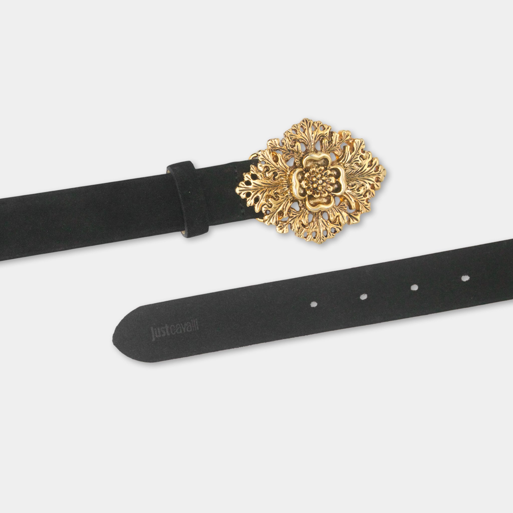 A black leather belt with a decorative gold buckle featuring an intricate floral design.