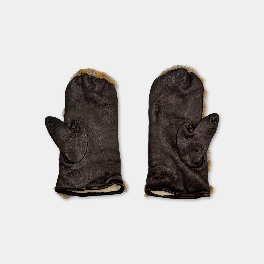 A pair of black leather mittens with fur lining.