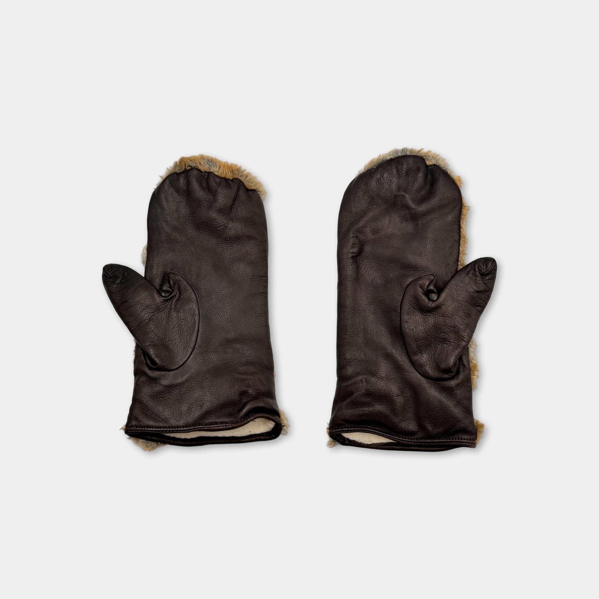 A pair of black leather mittens with fur lining.