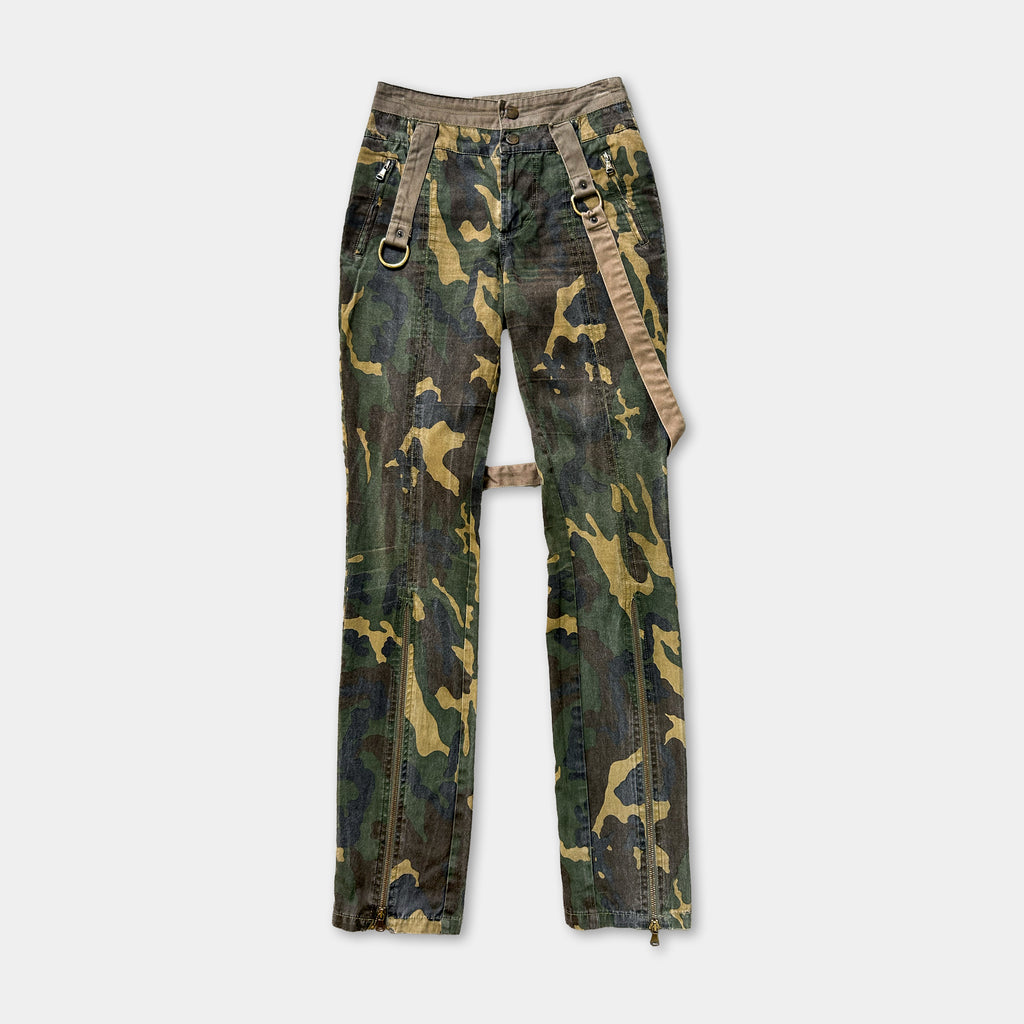 A pair of camouflage pants with a brown belt and zipper.