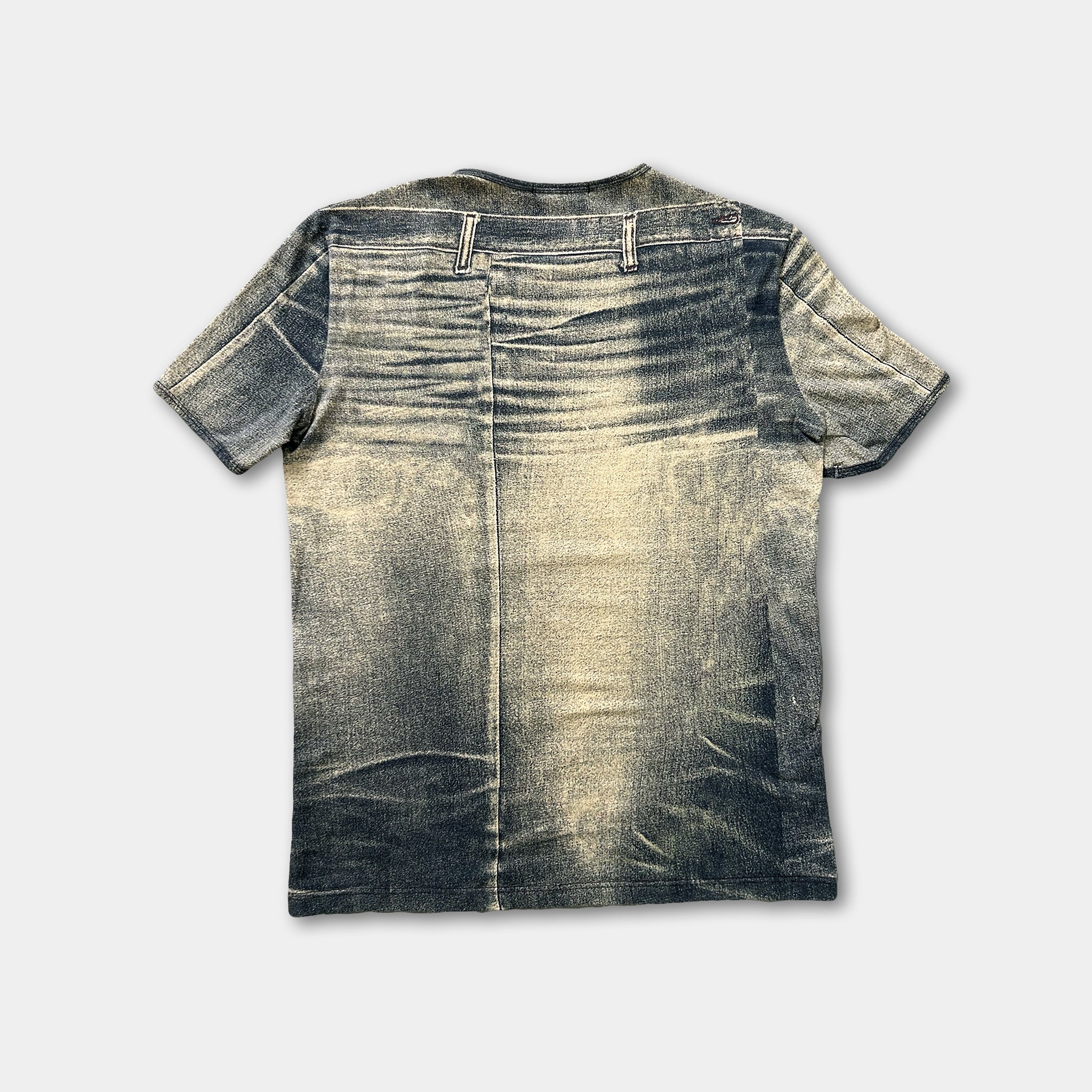 a t-shirt with a distressed, faded denim-like pattern.