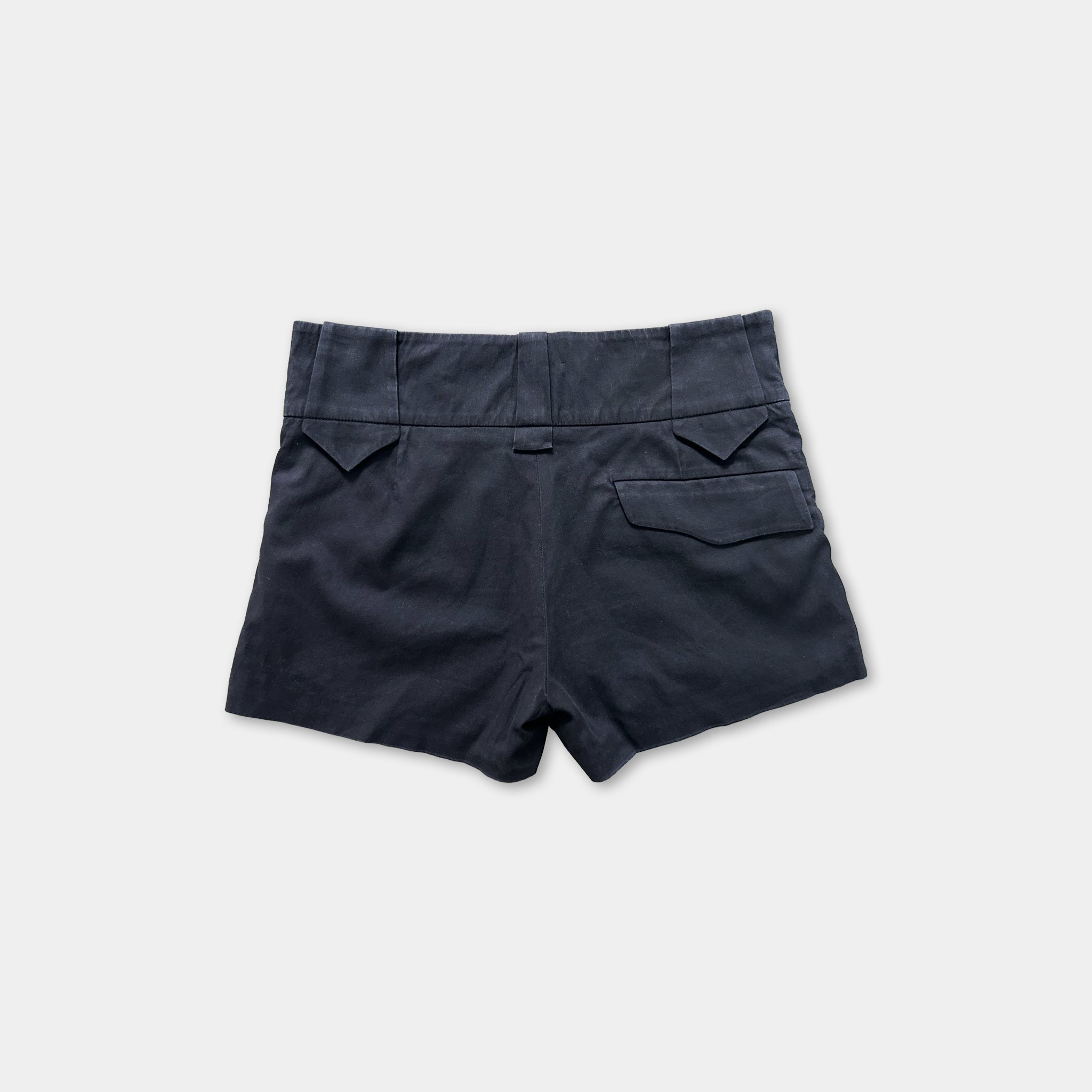 A pair of dark blue shorts with a high waist and a small pocket on the back.
