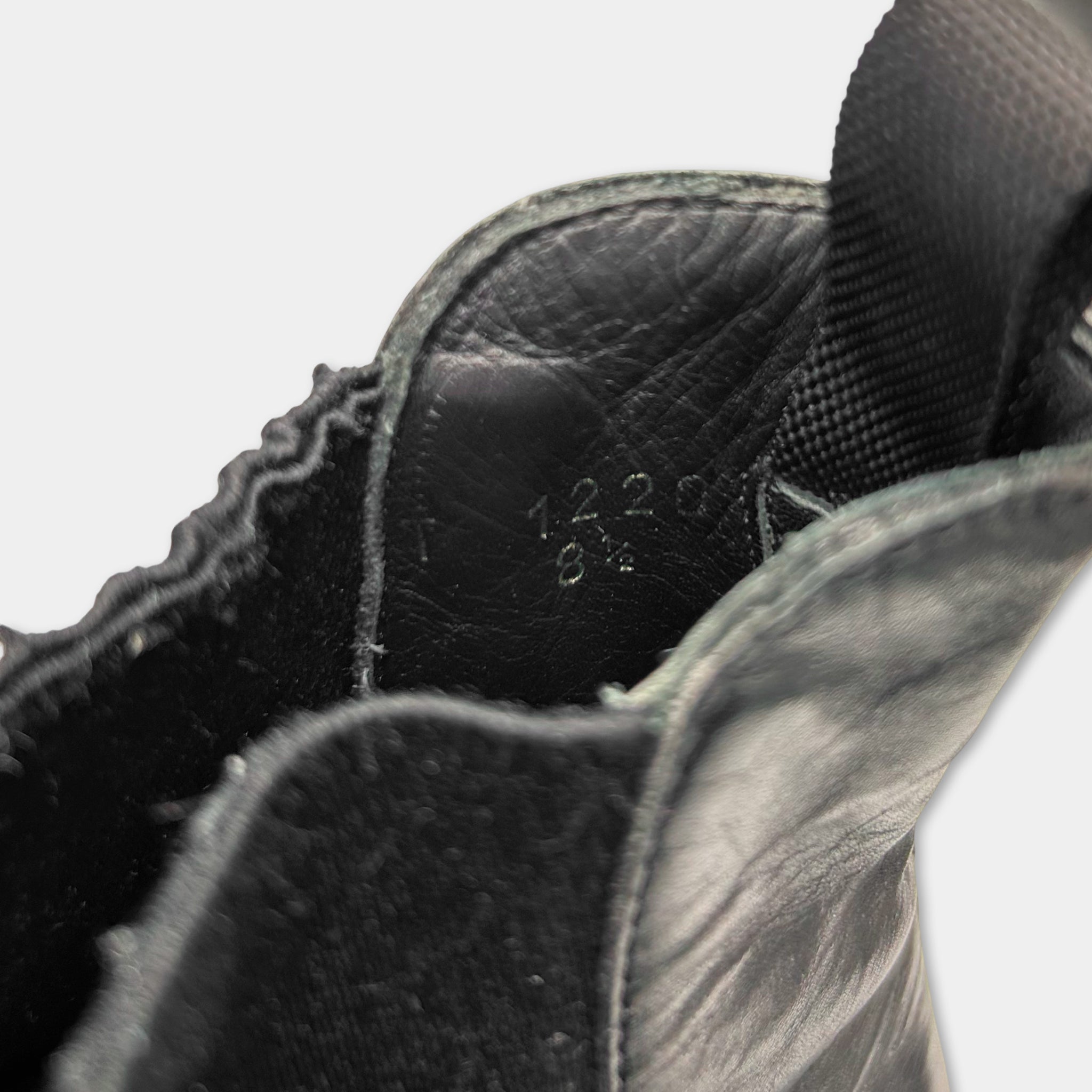 Prada Laceless Black Leather Sneakers