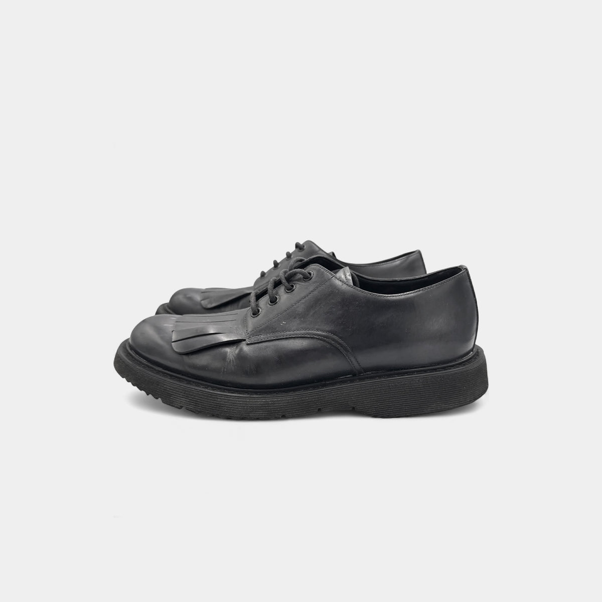 Prada Fringe Kiltie Leather Derby Shoes